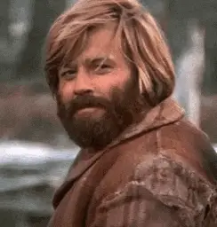 GIF: a bearded mountain man nodding in approval.